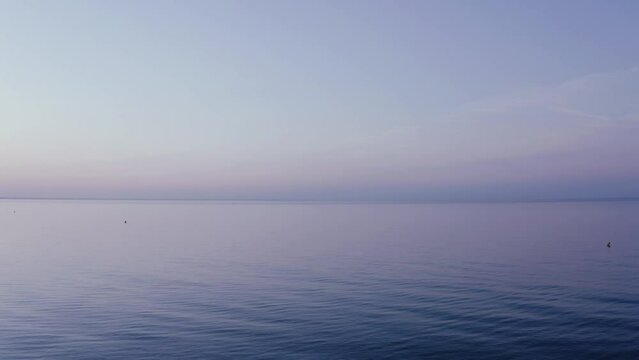 4k Beautiful tracking shot on the sea at sunrise
