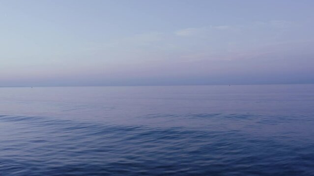 4k Beautiful tracking shot on the sea at sunrise