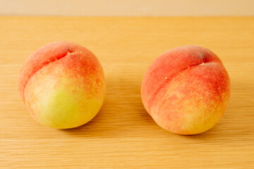 peach on a wooden table