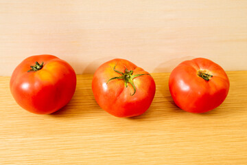 tomatoes on a wooden table