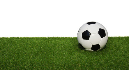 Soccer ball on grass isolated on white