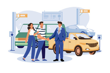 Happy customers couple handshaking with a manager in an auto salon