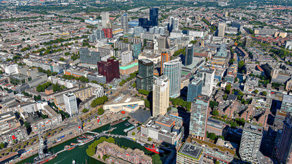 Rotterdam from above in Netherlands ft. new aerial skyline of the city center around business...