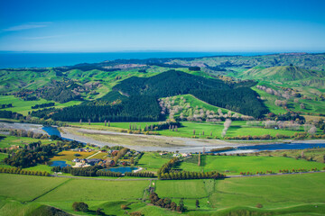 Obraz premium Aerial view of the Tukituki river valley and The Craggy Range Vineyard from Te Mata Peak. Beautiful day at Hawkes Bay, New Zealand
