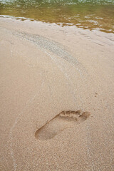 The footprints of the people on the sand