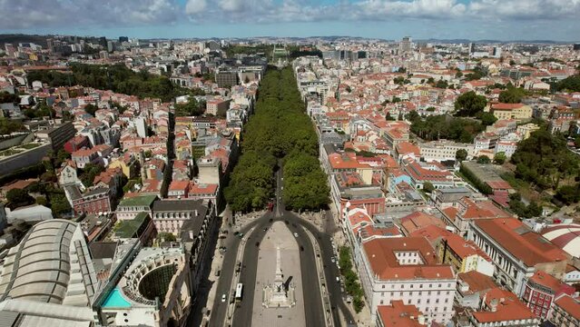Aerial drone view of Restauradores square looking north towards Avenida da Liberdade in Lisbon, Portugal
