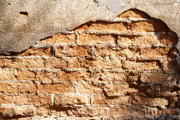 The walls built with clay bricks, old.