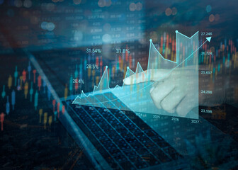 Double exposure of Stock market or forex trading graph for financial investment with laptop concept. Economy trends background for business idea and all art work design. Abstract finance background.