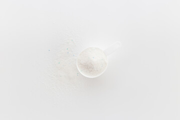 White laundry detergents powder with cup for laundry