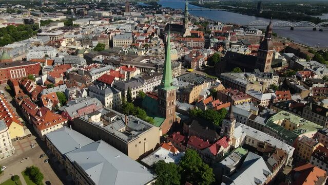 Amazing aerial view of the Town Hall Square in Riga, old steeples, Latvia, 4k