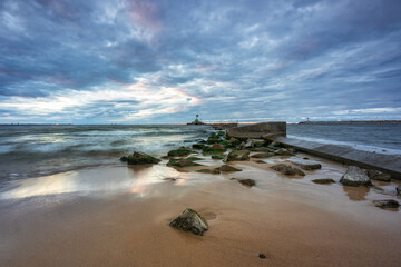 Sunset on the beach of the Baltic Sea in Gdansk, Poland