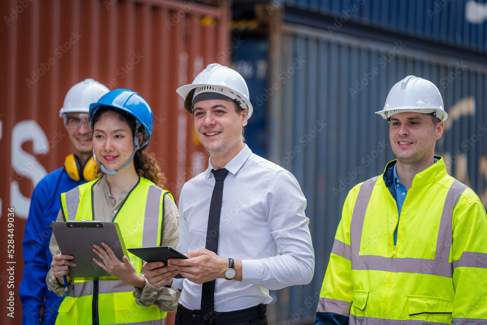 Poster Technicians or engineer with worker planning the transportation for import or export in the container yard warehouse,Container yard warehouse inspection.