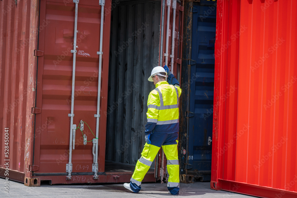 Aufkleber Cargo container worker checking and control loading Containers box in warehouse