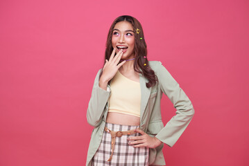 Young Asian teenage girl surprised excited isolated on pink background. - Powered by Adobe