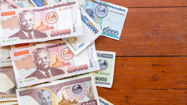 Top view Laos money kip banknotes, LAK, Laos Kip banknotes background. Money background. Laos currency, Kip. Pattern texture and background of Laos Kip money.