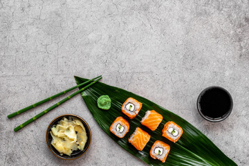 Sushi roll set eco served on green Bamboo leave, top view
