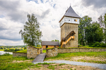 Fototapeta na wymiar Medieval Gothic Fortress with renovated tower