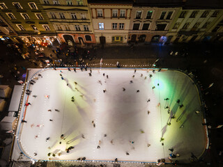 overhead view of Lviv city center at night christmas fair