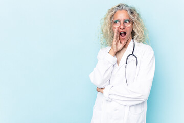 Middle age caucasian woman isolated on blue background is saying a secret hot braking news and looking aside