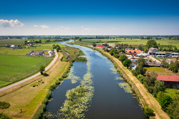 Fototapeta na wymiar Summer scenery of Sztutowo by the Wisla Krolewiecka river, Pomerania. Poland