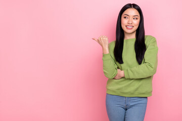 Photo of funny millennial lady index promo wear green sweatshirt isolated on pink color background