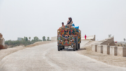 people are traveling on the top transport vehicles cause transportation crises 