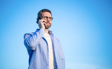 communication of man in glasses talk on phone. man talking on smartphone. man communication talk