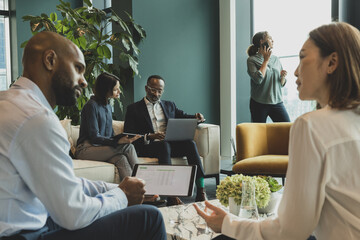 White collar workers meeting at an international business conference