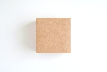 Small square cardboard box mockup for sticker, label or product presentation, blank box on white...