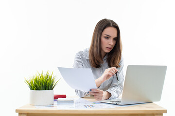 Fototapeta premium Working process in the office. A young woman secretary examines the documents