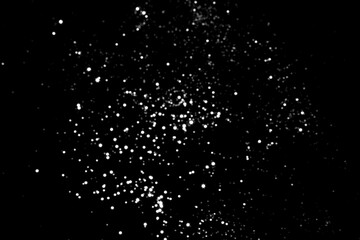 White gray blurred bokeh lights on black background. Glitter sparkle stars for celebrate. Overlay for your design