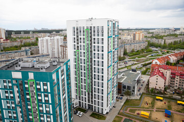 Residential complex, 25 storey and 16 storey residential buildings and townhouse, bird's eye view of the city. Western part of the Yekaterinburg city, Akademichesky