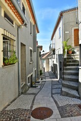 A narrow street in Castelgrande, a rural village in the province of Potenza in Basilicata, Italy.