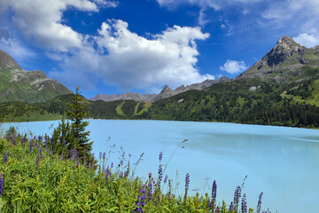 Reservoir lake with mountains epic landscape. Idyllic reservoir Kops lake at 1800 m in austrian...