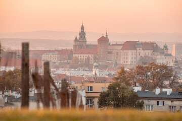 Wawel Castle and Cracow city during sunset. Photography taken from Krakus Mound. Pastel and soft...