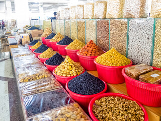 Oriental Bazaar. Almond peeled and unpeeled, nuts sales in market. Dry food, variety almonds in...