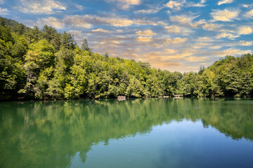 Fototapeta na wymiar Lake hidden in the forest. Turkey Bolu Yedigoller. Lake view in cloudy weather