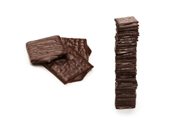Dark chocolate candies isolated on white background.