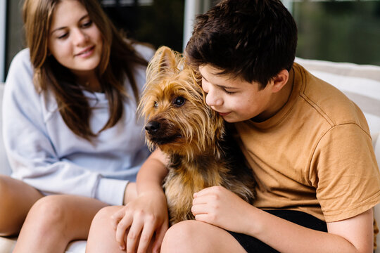 teens with their dog, australian terrier