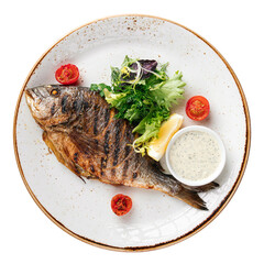 Portion of grilled dorado fish with salad