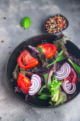 tomato salad vegetable healthy meal food snack diet on the table copy space food background rustic top view keto or paleo diet veggie vegan or vegetarian food