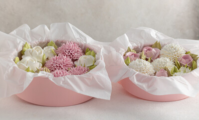 Zephyr bouquet of flowers in a gift box on a light background, holiday concept, Valentine's Day