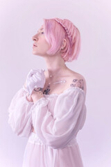 Fantasy woman nymph isolated on white background. Princess girl in white dress and pink hair
