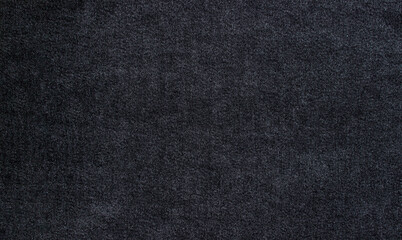 Fototapeta na wymiar Dark denim texture as background for your image. Modern high quality material for clothes.