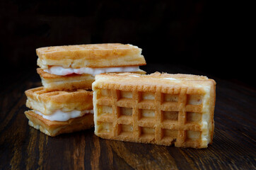 Square fresh Viennese waffles with cream.