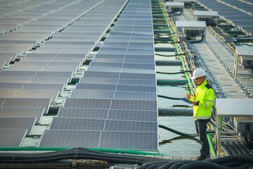 Portrait of professional man engineer working checking the panel