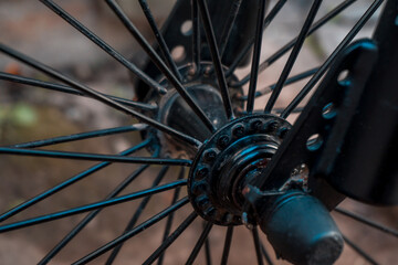 Fototapeta premium the bike in details is orange with black wheels worn not new