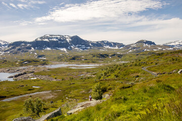 People, children enjoying the amazing views in Norway to fjords, mountains and other beautiful nature