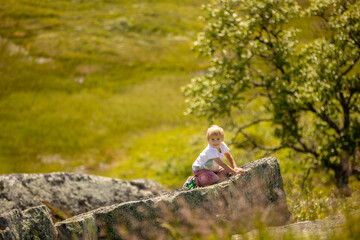 People, children enjoying the amazing views in Norway to fjords, mountains and other beautiful nature