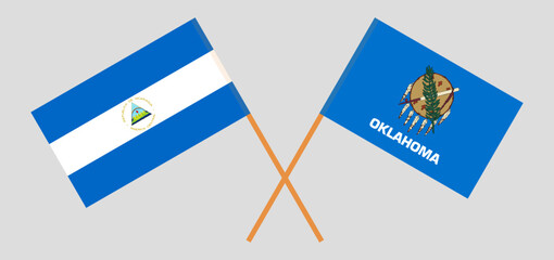 Crossed flags of Nicaragua and The State of Oklahoma. Official colors. Correct proportion